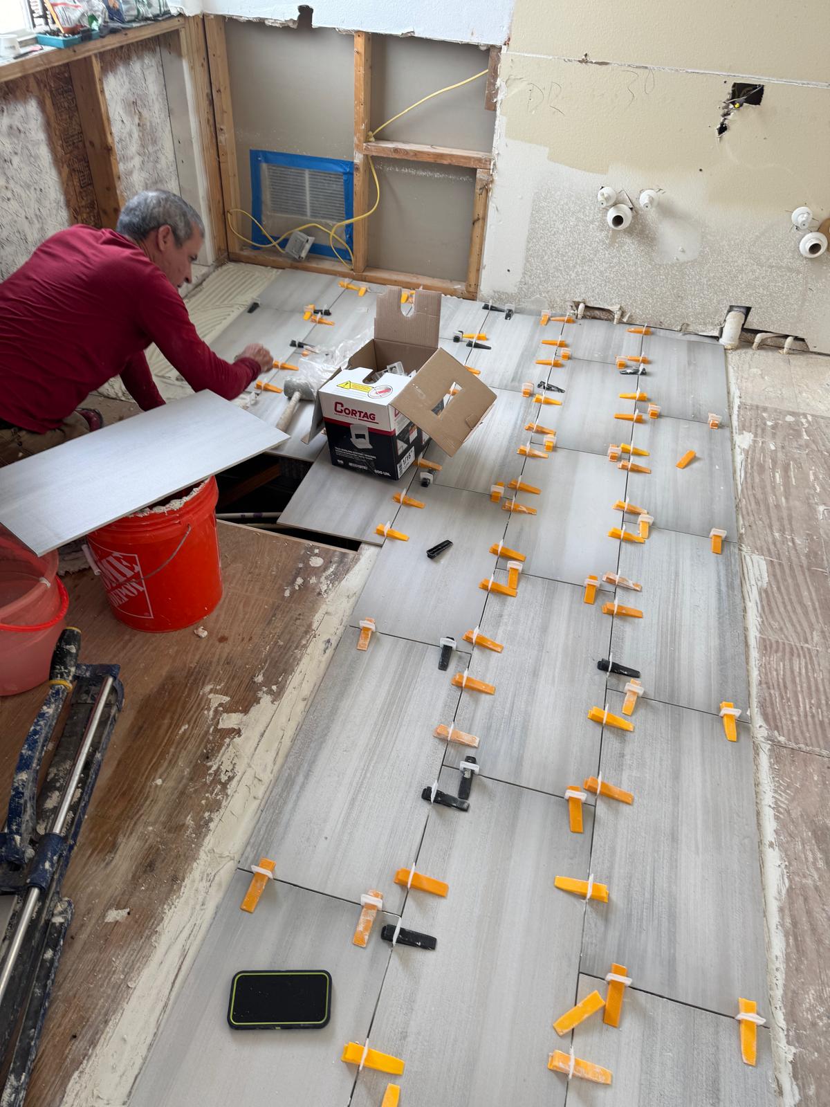 Bathroom floor tile layout and leveling work