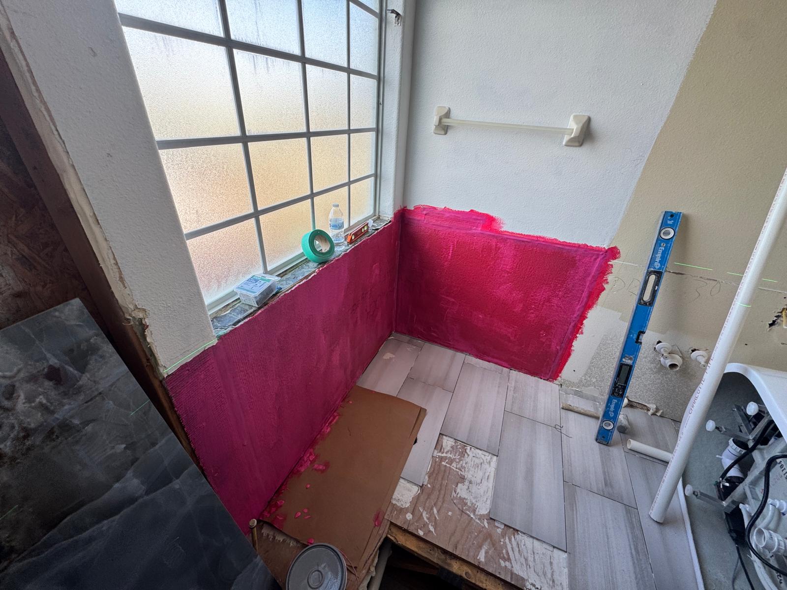 Bathroom waterproofing and wall prep during remodel